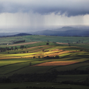 Blaze and Barrock Fells in North Eden Valley with Rain beyond over the Solway Firth and Carlisle